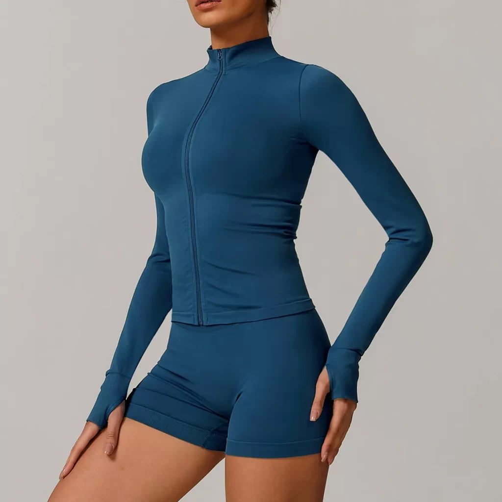 Seamless Wholesale Clothing Cropped Zip Up Workout Jacket with Thumb Holes Women's seamless apparel manufacturers