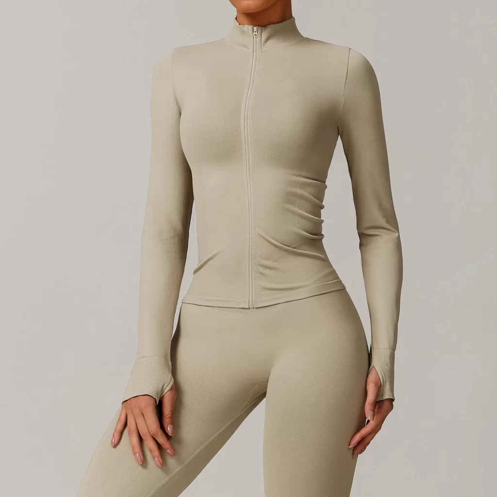 Seamless Wholesale Clothing Cropped Zip Up Workout Jacket with Thumb Holes Women's seamless apparel manufacturers