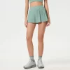 Custom Spark Apparel Tennis Pleated Skirts with Built-in Athletic Shorts athleisure manufacturers wholesale womens activewear private label activewear